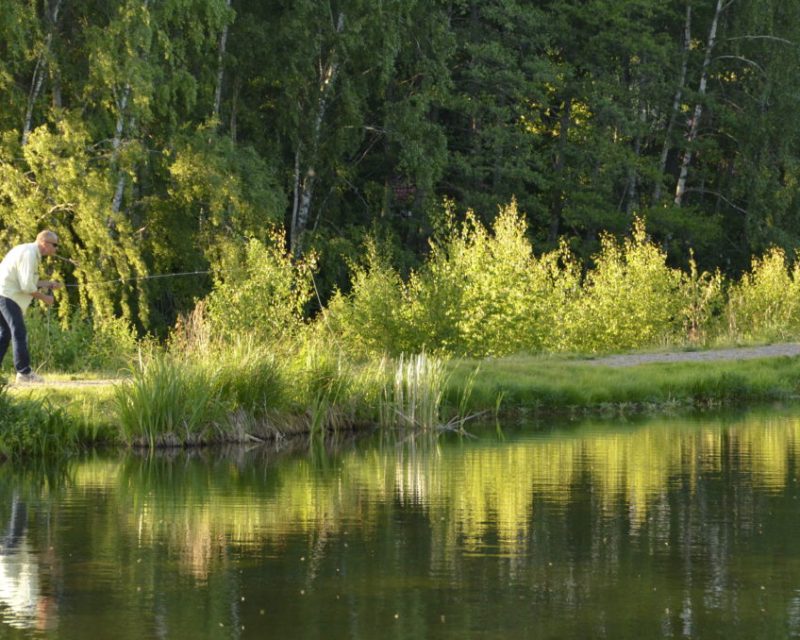 man fishing at the river